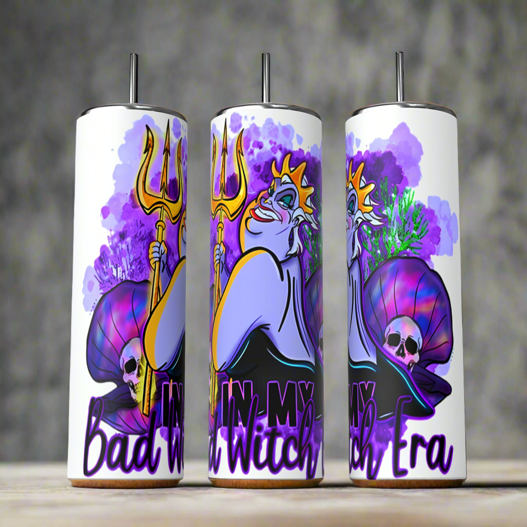 Front, back and side view of Bad Witch Era Tumbler featuring Spooky Feeling design on the front and a skull in a shell on the side, plain white on the back.